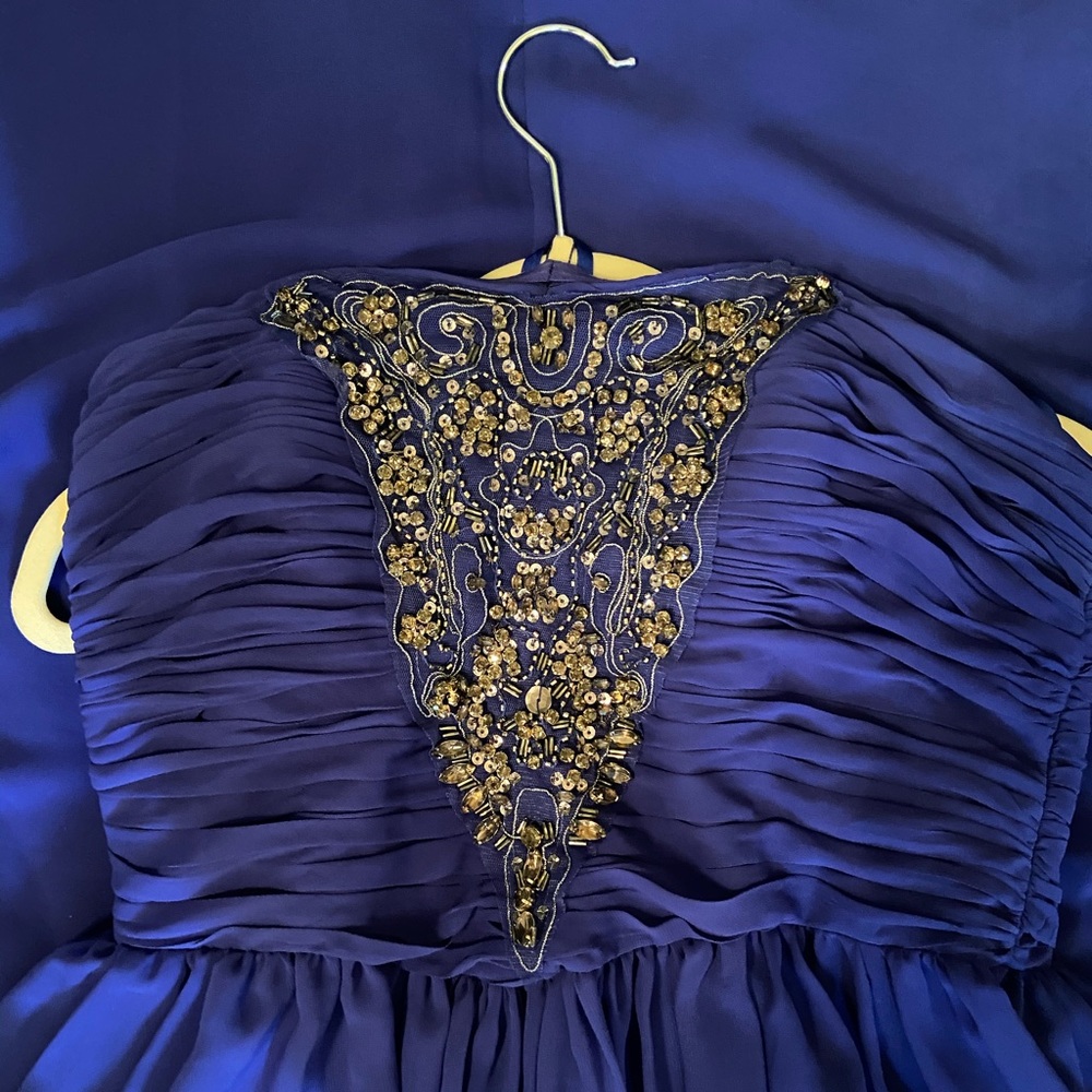 Emerald blue sequined ball gown